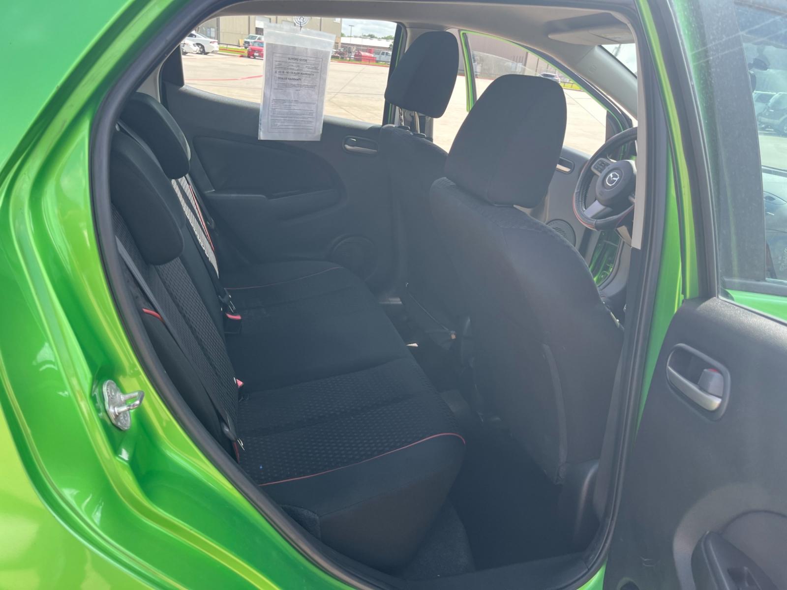 2013 green /black Mazda MAZDA2 Touring (JM1DE1LY1D0) with an 1.5L L4 DOHC 16V engine, Automatic transmission, located at 14700 Tomball Parkway 249, Houston, TX, 77086, (281) 444-2200, 29.928619, -95.504074 - Photo #12